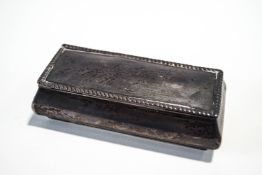 A late Victorian silver box, Sheffield 1897, of rectangular form, with a hinged lid, 11 cm long,