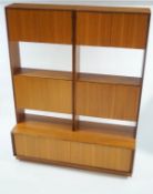 A G-plan Fresco teak double wall unit with closed and open shelves and cupboards,