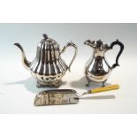 A silver plated teapot; a hot water jug;