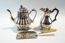 A silver plated teapot; a hot water jug;
