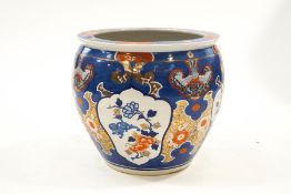 A large modern Chinese jardiniere, decorated in the Imari palette,