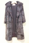 A Russian squirrel fur coat, with Russell Smith of Loughborough label,
