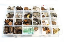 A collection of assorted coinage to include pennies, farthings, six pences, crowns, foreign etc.