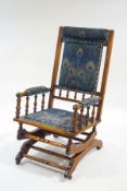 A late 19th Century American beech rocking chair,