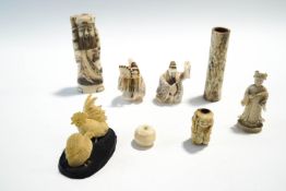A quantity of pre- 1947 Ivory, bone and other carvings, including Japanese netsuke,