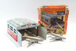 A Mettoy tin plate MetAir Hangar and two aircraft,
