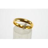 A 22 carat gold wedding ring, 3.