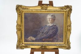 A late 19th/early 20th century portrait of a seated lady, watercolour, 70cm x 51cm,