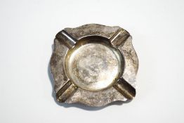 A silver hallmarked ashtray of square shaped outline, 12.2 cm across, 107 g (3.