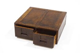 An early 20th Century oak table top filing unit, with two drawers,
