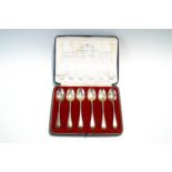 A set of six silver 'British Hallmark' tea spoons, 1935, old English pattern, 97 g (3.