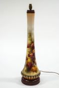 A large Royal Worcester table lamp, probably by Kitty Blaike, hand painted with autumnal leaves,