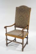A 19th Century open armchair with barley twist supports and wool tapestry style upholstery