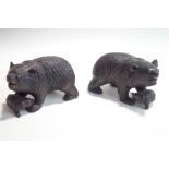 A pair of Bavarian carved wood figures of bears with their cubs, glass eyes and bone teeth,