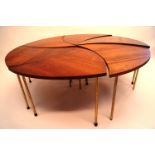 Six "Pinwheel" FD523 teak tables with brass effect legs,