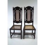 A pair of 17th Century style carved oak chairs, with cane seats and backs, bobbin turned ,