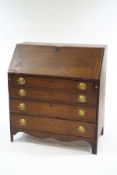 A 19th Century mahogany bureau with pigeon hole and drawer interior,