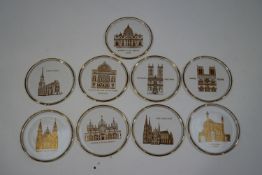 A set of nine 1970's Orrefors Limited edition glass plates, depicting buildings of worship in gilt,