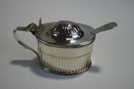 A George III silver mustard pot, makers mark H.A.
