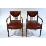 A pair of 19th Century oak elbow chairs,