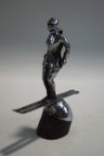 A 19th Century Art Deco chrome plated car mascot of a skier,