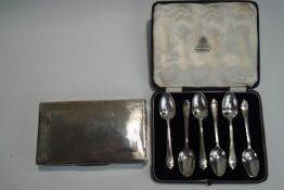 A cased set of six silver teaspoons; with a silver cigarette box; 86 g (2.