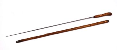 A 19th Century sword stick in a bamboo case with a white metal wire collar