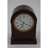 An Edwardian two train mantel clock, striking on a bell, in mahogany case,