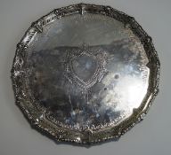 A Victorian silver salver, by Albert Henry Thompson, Sheffield 1887, of circular shaped outline,
