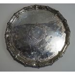 A Victorian silver salver, by Albert Henry Thompson, Sheffield 1887, of circular shaped outline,