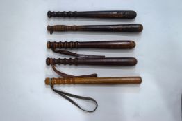 Five Victorian turned wooden truncheons,
