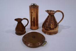 Two copper harvest jugs,