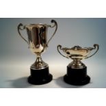 A two handled silver trophy cup,