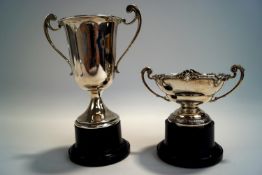 A two handled silver trophy cup,