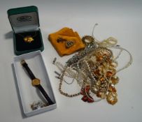 A collection of costume jewellery to include a quantity of earrings set in gold and silver,