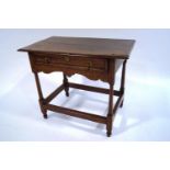 An 18th century style oak side table, with single drawer,