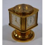 An Angelus combination desk clock, barometer, hygrometer, thermometer, and compass, 3.
