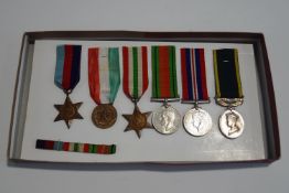 A collection of WWII medals, three named to Lt T J V FIELDEN BEDFS & HERTS,