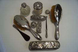 A quantity of Victorian and later silver topped dressing table jars, brushes, shoe horn,