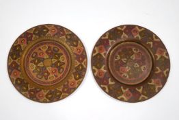 A pair of decorative Middle Eastern brass wall plates, with painted decoration, 30.