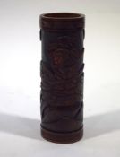 A Japanese bamboo brush wood pot with carved decoration of warriors,