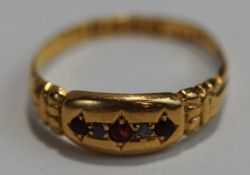 An 18 carat gold five stone red paste and rose diamond ring, Chester 1916, finger size Q, 1.