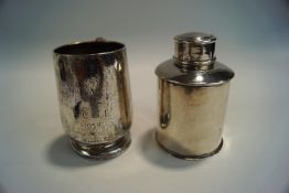 A silver tea caddy, Chester 1907, of plain cylindrical form with a pull off cover, 9.
