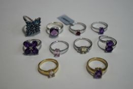 A collection of ten modern silver and stone set rings, stamped 925,