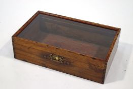 A mahogany table top display cabinet,