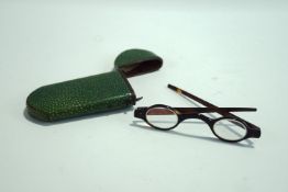 A George III pair of tortoiseshell glasses,