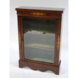 An Edwardian mahogany and inlaid glazed cabinet,