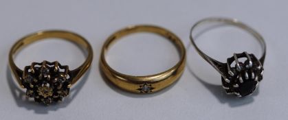 A 9 carat gold sapphire and illusion diamond set ring,