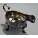 A George III silver sauce boat, makers mark S.M. or W.S.