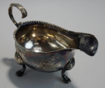 A George III silver sauce boat, makers mark S.M. or W.S.